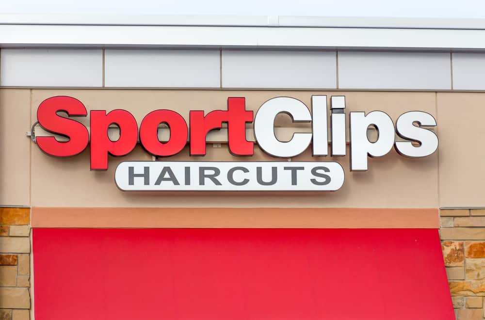 Sport Clips building signage - home of the steamed towel massaging shampoo and triple-play package.