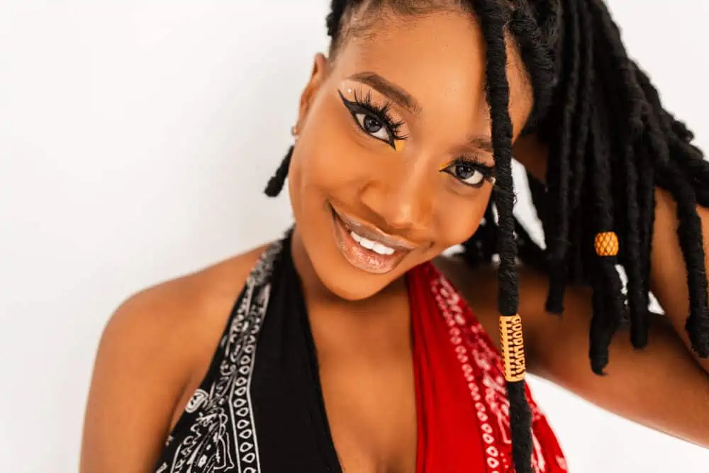 Where Did Dreadlocks Originate? The True History of Dreadlocks 1 Cute African American female 4B natural hair wearing twisted locks as she embraces the Rastafari movement.