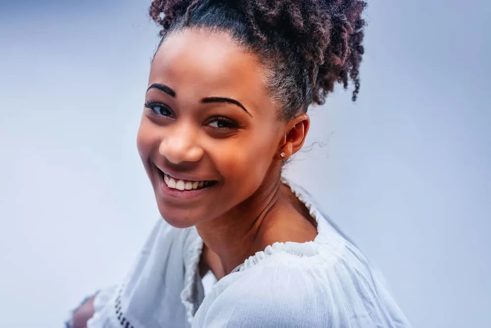Can You Use Toner Without Developer? Best Toners on the Market 1 Young African American female wearing a semi-permanent hair color on her bleached hair cuticles.