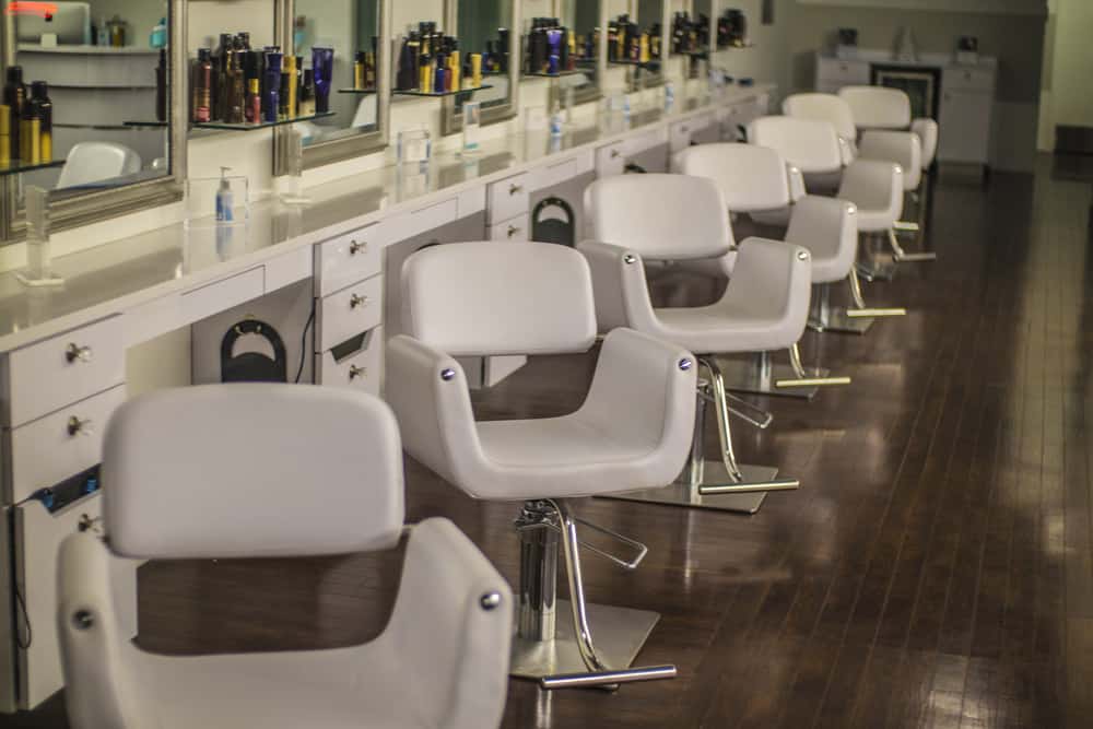 Beauty salon row of chairs inside one of many hair salons in the Atlanta, GA area.