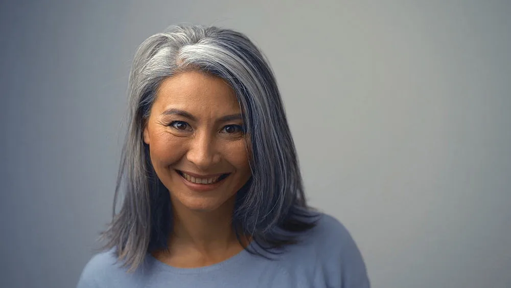 Removing Hair Color to Go Grey at Home: DIY How-to Guide 14 Deep conditioning treatments to repair brittle strands have made an elderly woman with naturally gray hair beam.