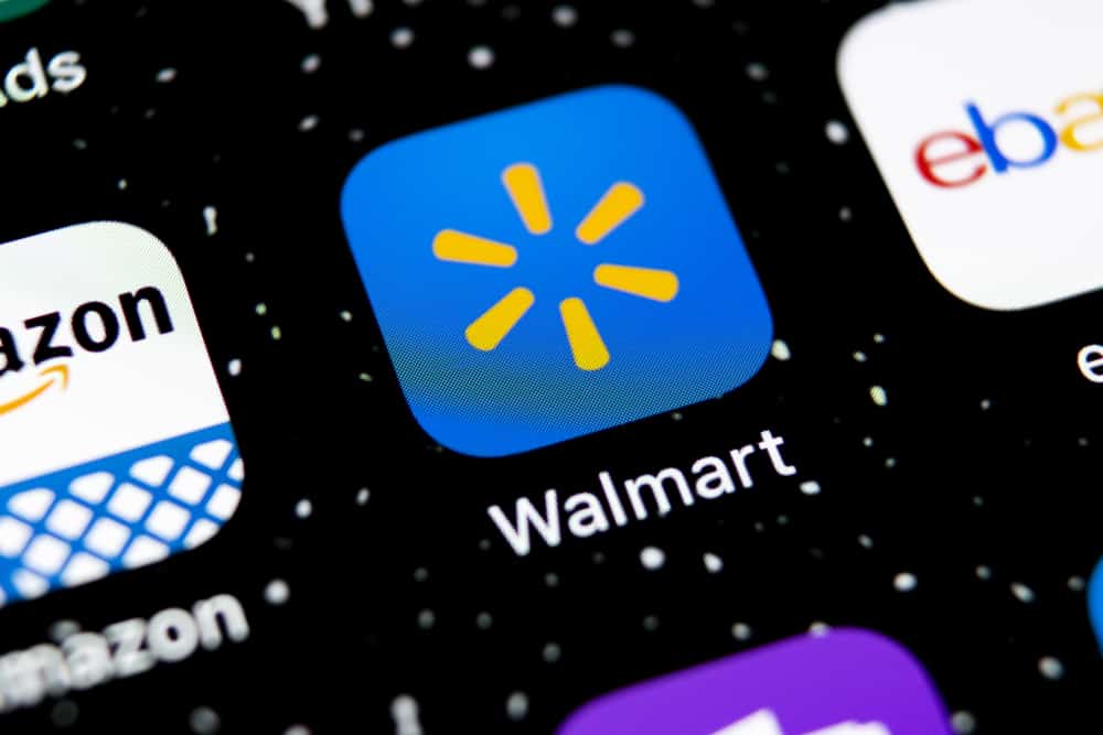 Walmart has a mobile phone app that you can use to confirm current pricing within Walmart stores.