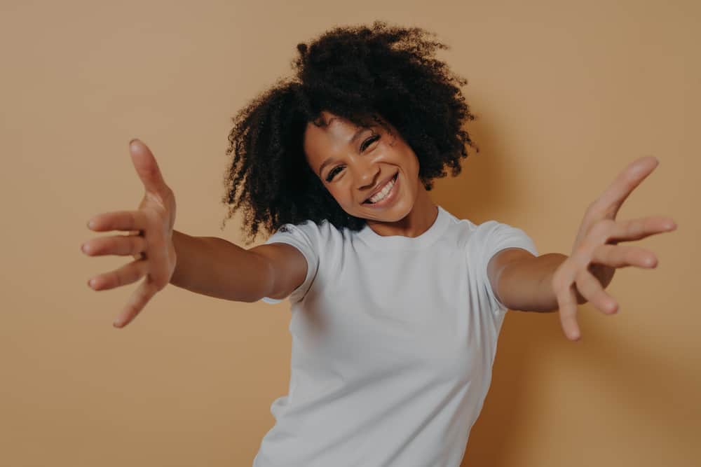 African American female with longer hair than it appears - since it's curly instead of straight hair.