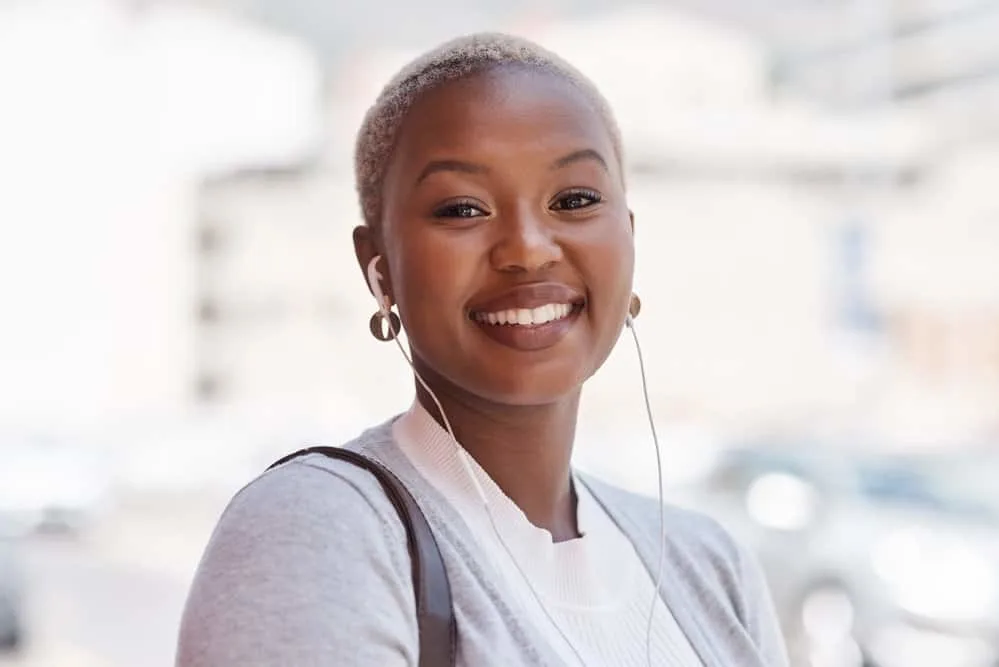 TWA Hairstyles: Short and Medium TWA Styles and Haircuts 1 Cute African American female with a light-brown skin tone and a TWA hair length that requires minimal styling.
