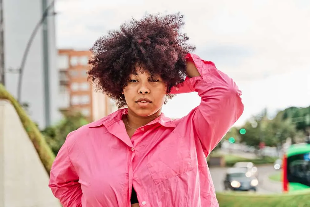 Why Do Hairdressers Hate Box Dye? Is Box Dye That Bad? 6 A young black girl after blending red permanent color with dark brown hair - her previous color.