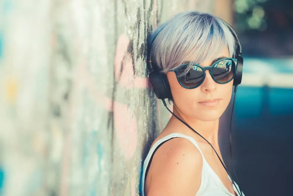 The Best Blue Hair Dyes for Dark Hair Plus Alternatives 7 Beautiful young female with blue-black hair dye in her 1C straight hair type.