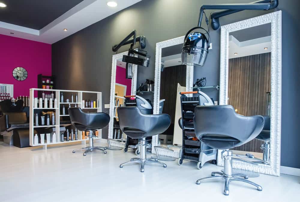 Interior of a beauty salon that offers adult haircut services, conditioning treatments, and other similar services.