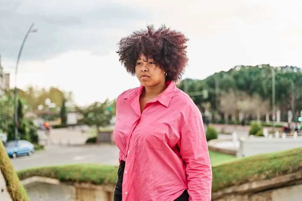Why Do Hairdressers Hate Box Dye? Is Box Dye That Bad? 5 After getting a hair color treatment at a salon, this lovely African American woman was able to cover her gray hair.