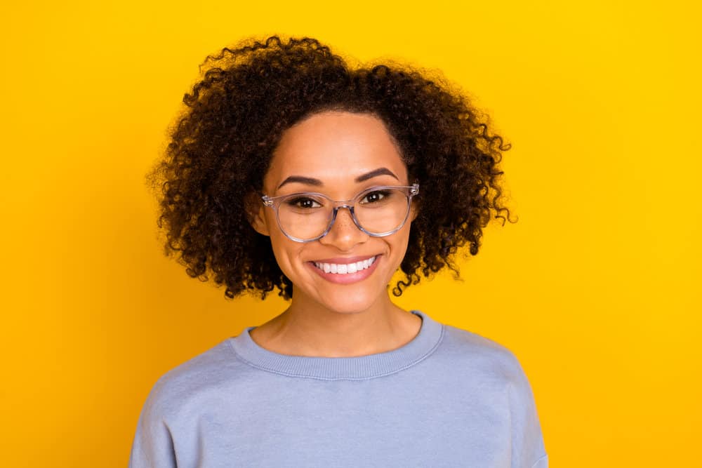 An attractive black woman from the United States, wearing a nice hair mask originally created by a famous rap star.