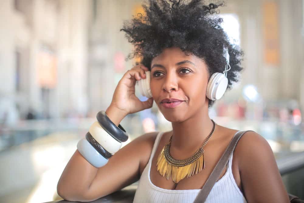 Cute young black female after getting one of the most popular Great Clips hairstyles due to their affordable prices.