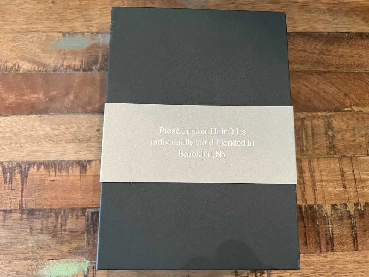 How Much Does Prose Hair Care Cost? Are the Products Worth It? 5 Prose box showing that the custom hair oil is individually hand-blended in Brooklyn, New York.