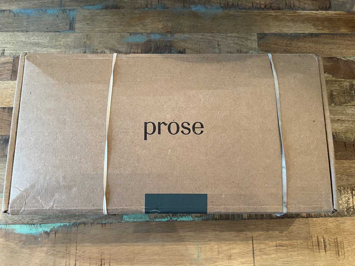 Unopened box of Prose personalized hair care products including a Prose shampoo and conditioner for thick hair.