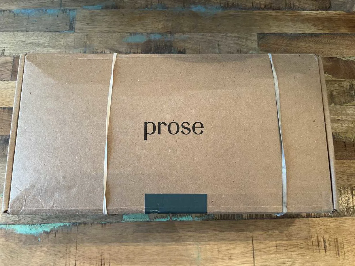 Does Prose Work for Hair Growth? Can It Really Make Your Hair Grow? 1 Unopened box of Prose personalized hair care products including a Prose shampoo and conditioner for thick hair.
