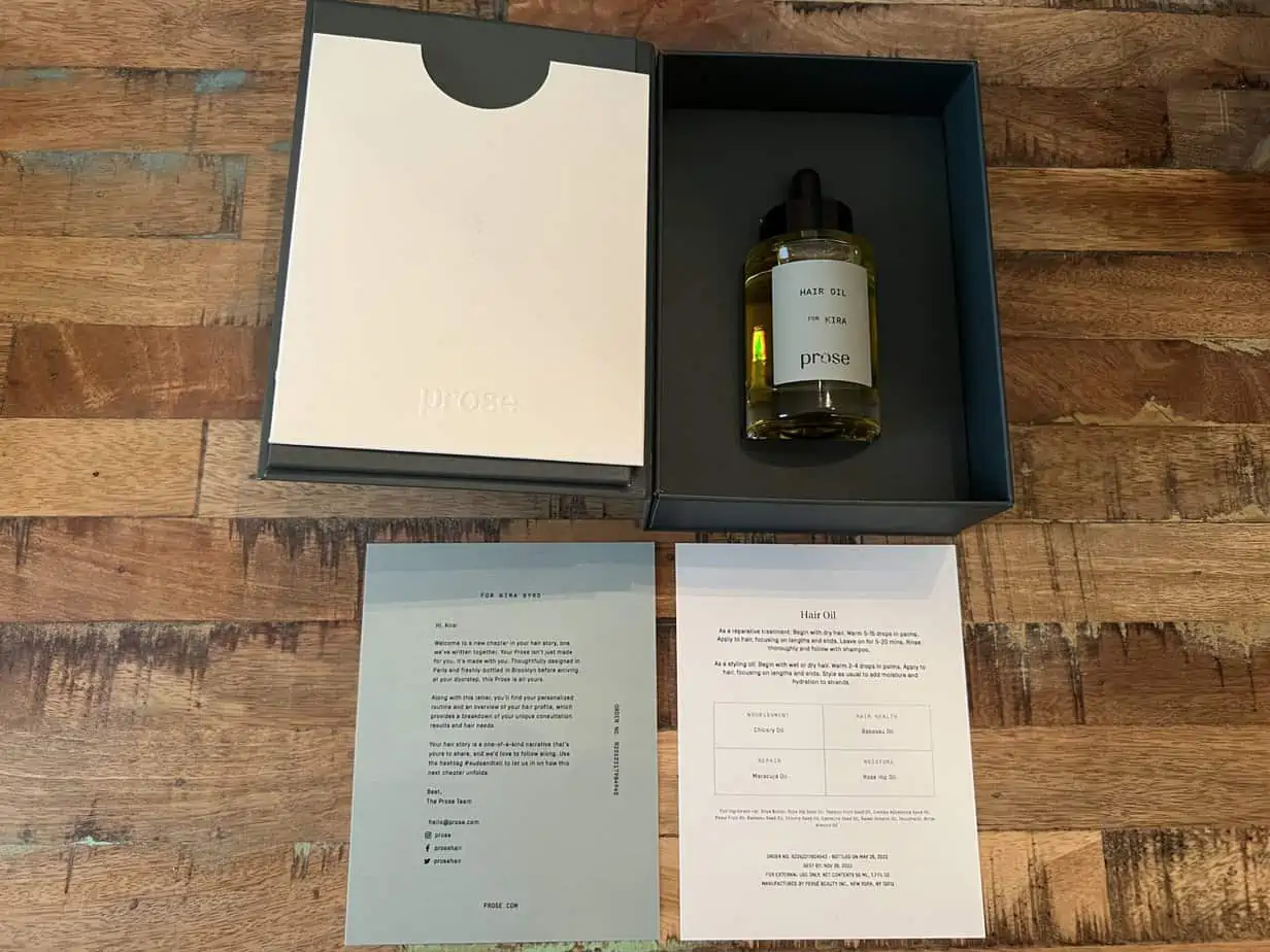 Unboxing showing hair oil instruction sheet designed for Kira's specific hair goals and hair concerns.