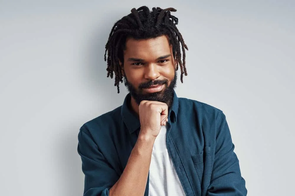 How To Get Dandruff Flakes Out Of Dreadlocks: DIY Step-by-Step 6 A black male with a 4B hair type that has an itchy scalp that requires an anti-dandruff shampoo.