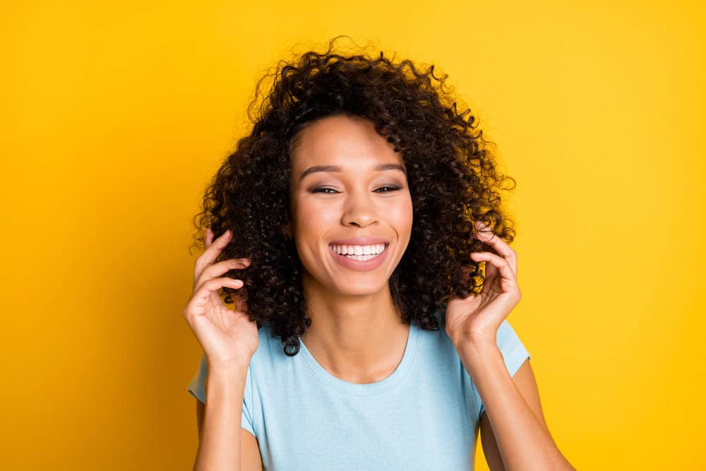 A sweet light-skinned girl after bleaching hair and mixing two different semi-permanent hair dyes for a lighter shade.