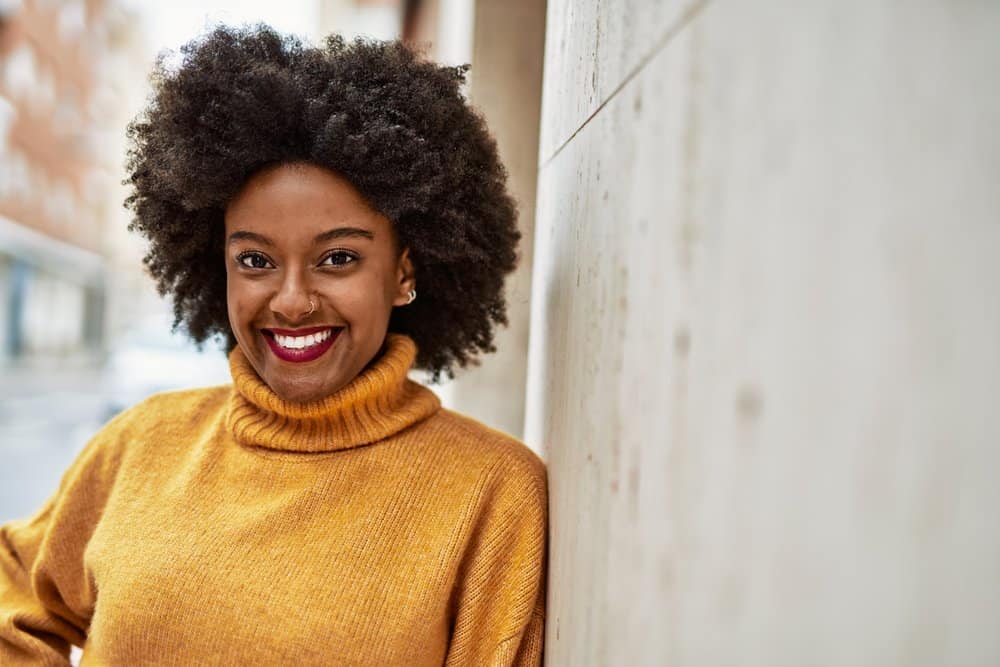 Young African American female with an ash gray natural hair color that wants to blend her darker hair to look natural.