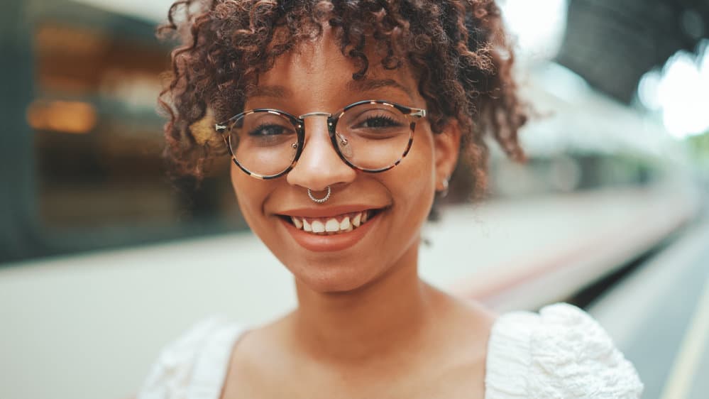 A black female with wavy hair after using the Curly Girl Method had very straight hair as a child (e.g. baby hair).