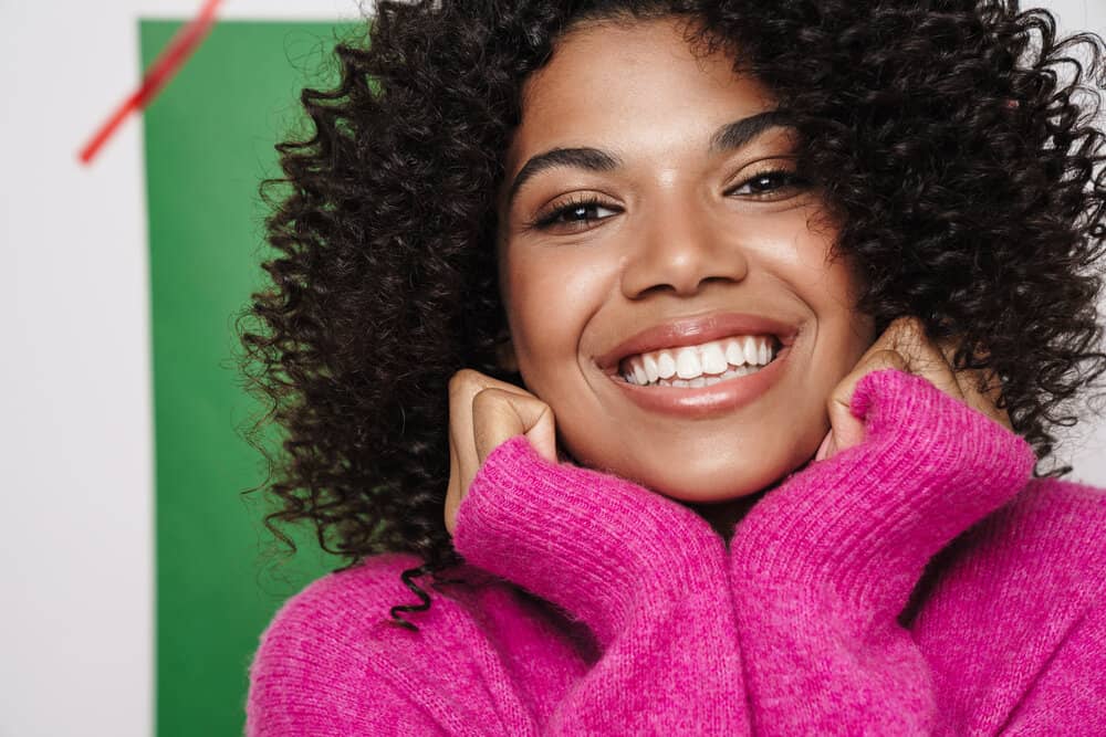 Light-skinned female with healthy hair has struggled with oily, dirty hair due to scalp shed from treating dandruff.