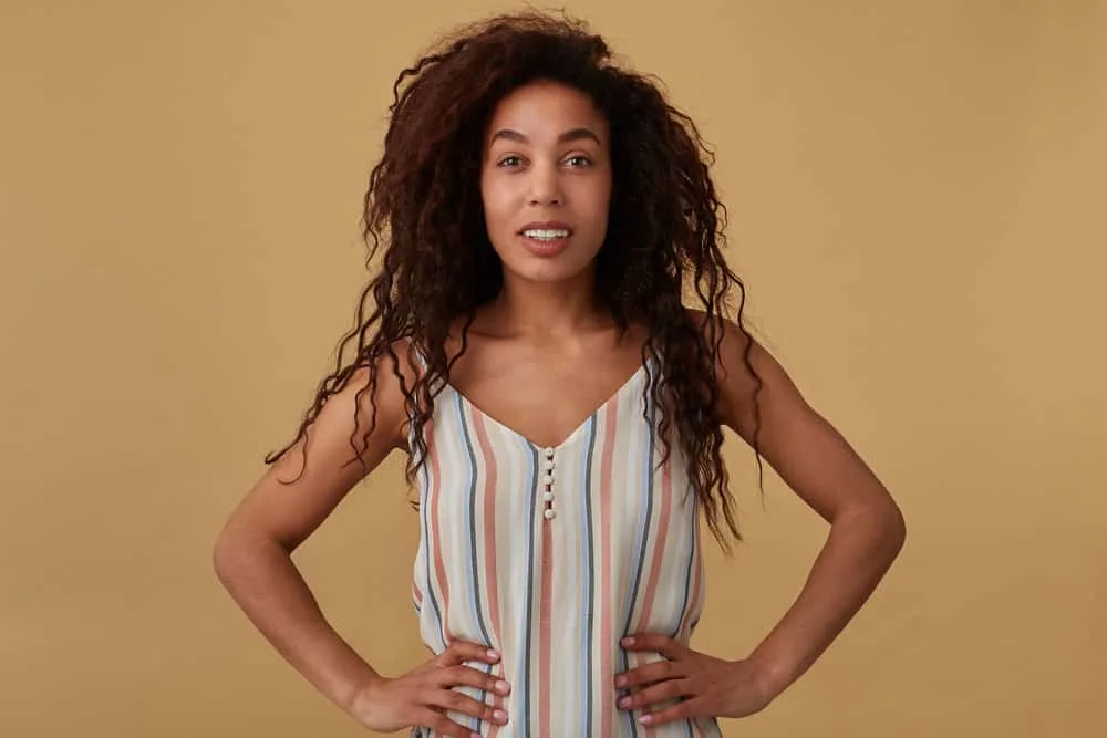 Bumped Ends: How to Bump the Ends of Your Hair at Home 5 This young lady is preparing for a YouTube video and has achieved her desired look after taking down a wavy ponytail.