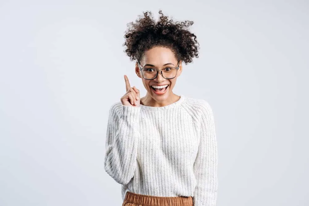 Does Maui Moisture Cause Hair Loss? What About Their Shampoo? 4 A black woman with light brown skin has recently washed her hair with completely natural Bamboo fiber shampoo.