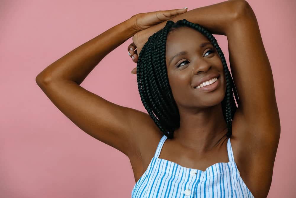 A black girl used the banding method with her hair wet and followed up with a deep conditioner to create box braids.