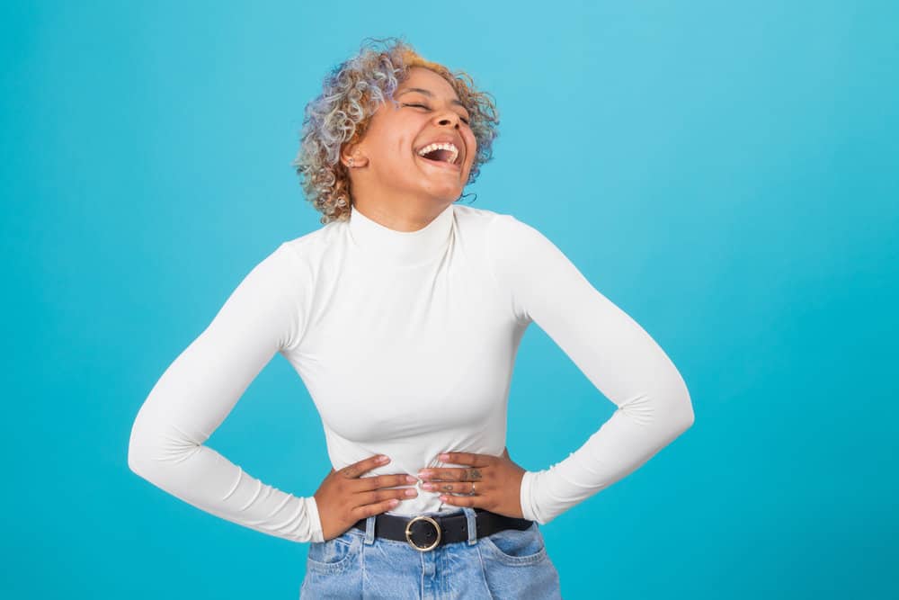 A black female looking to protect colored hair every day after using a particular dye made for a curly hair cuticle.