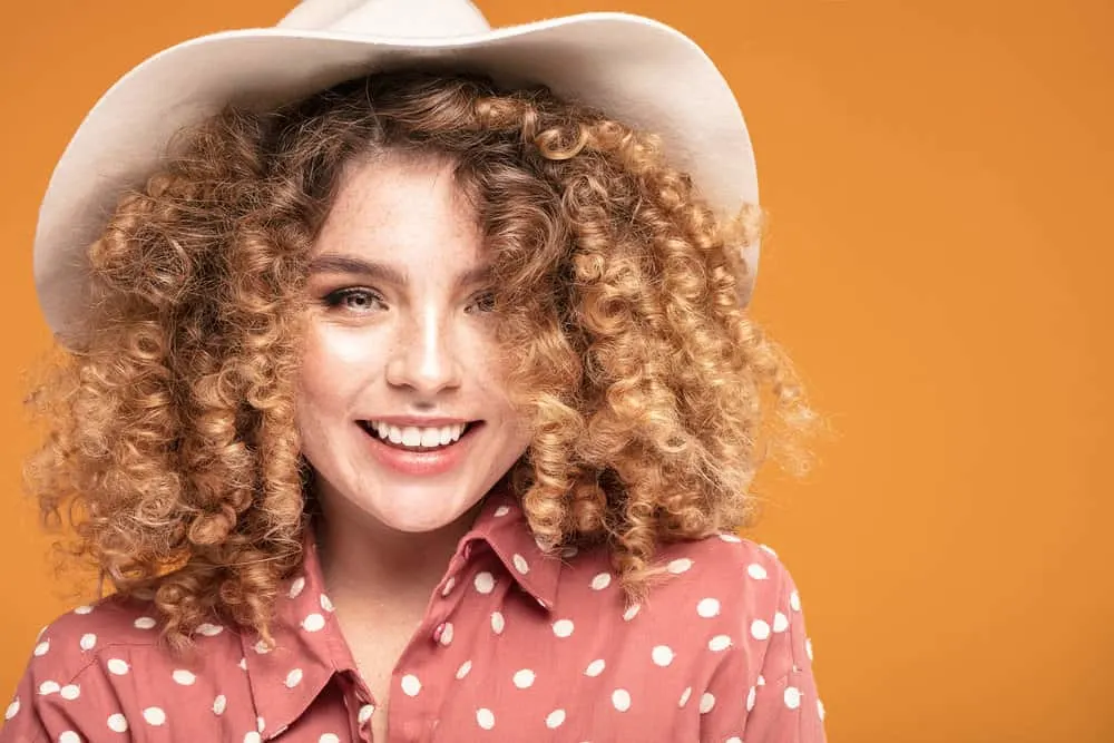 How Long Does Bleached Hair Last and How to Repair Damage 3 After getting her natural hair bleached, a white girl wants to promote healthy hair growth with her regimen.