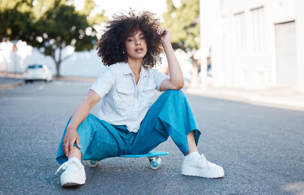 A cute young lady with curly hair follicles had weak hair just two years ago. Now she has beautiful natural curls.