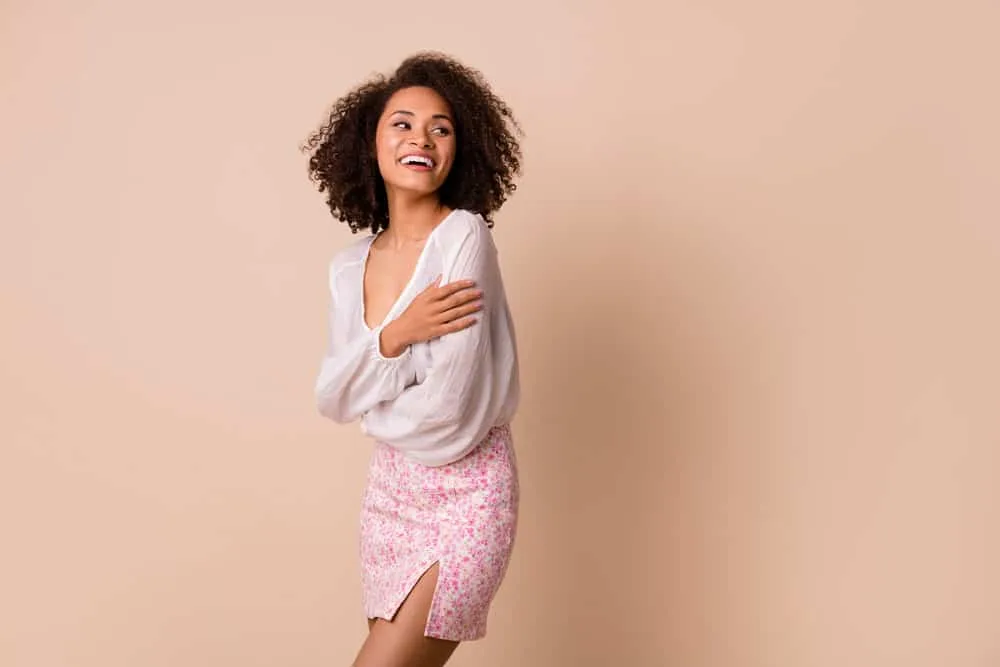 How Coconut Oil Ruined My Hair: The Dangers of Coconut Oil 6 Adorable young lady with a mix of 3B and 3C hair types on her naturally curly hair that was styled with grapeseed oil.