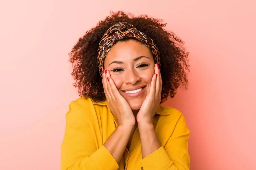 How to Get Splat Hair Dye Off Your Skin: DIY Step-by-Step 4 African American female with bleached hair strands cleaned with clarifying shampoo and dishwashing soap.
