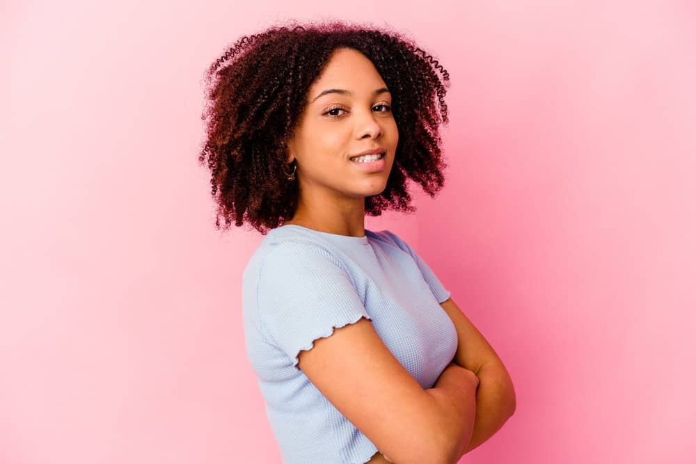 Light-skinned black lady with one of the most common coily hair types (4A) for African American females.