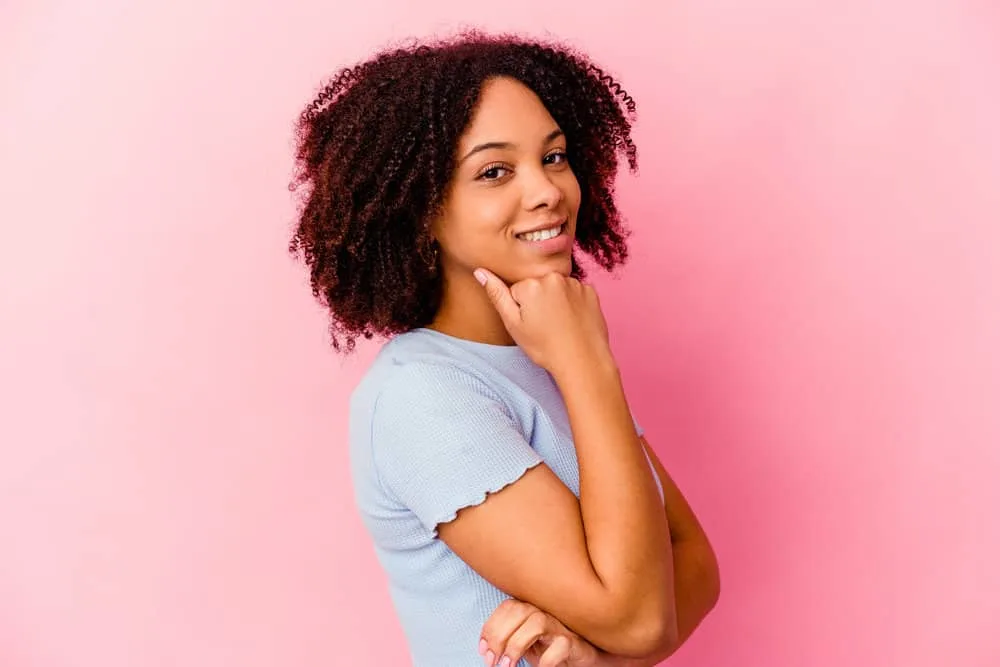 What Is 4A Hair? How To Take Care of It, Styles, and Products 1 A young black female with dry hair has a curly hair type that's been styled after a deep conditioner.