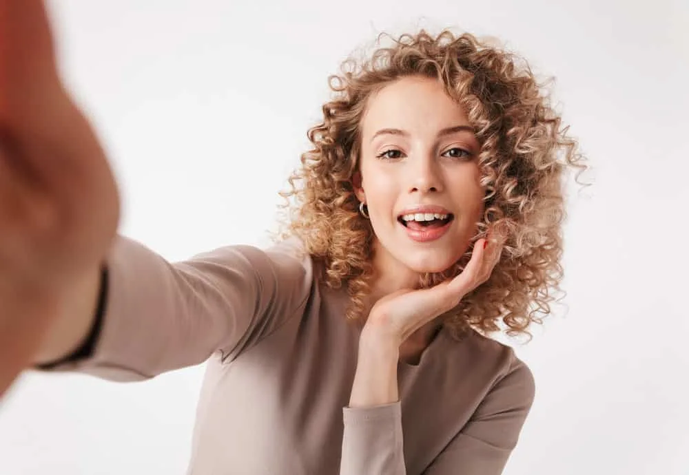 How Much Does Balayage Cost? Average Balayage Prices 2 A beautiful white female with balayage highlights created with traditional foil highlights on her medium-length long hair.