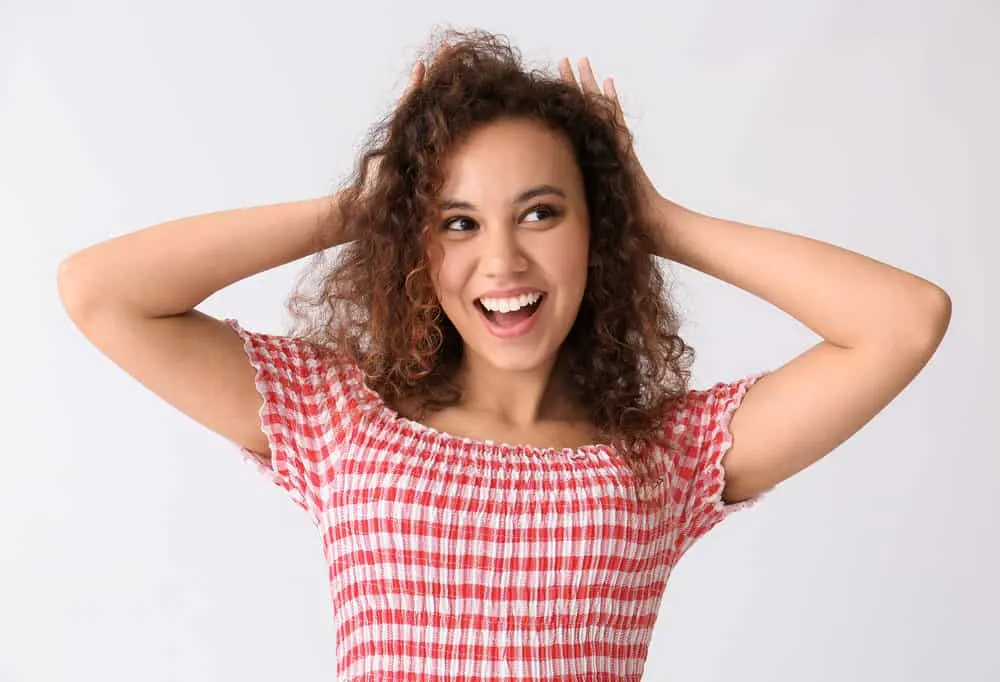 What Is 3B Hair? How To Take Care of It, Styles, and Products 6 A young mixed-race female is a 3B with S-shaped curls according to Andre Walker's hair typing system.