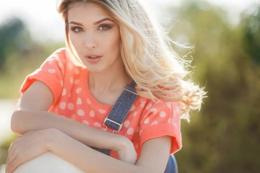 Dyeing Brown Hair Blonde Without Bleach: DIY Step-by-Step 2 A Caucasian female used lemon juice to lighten hair from a medium-brown color to a lighter desired shade.