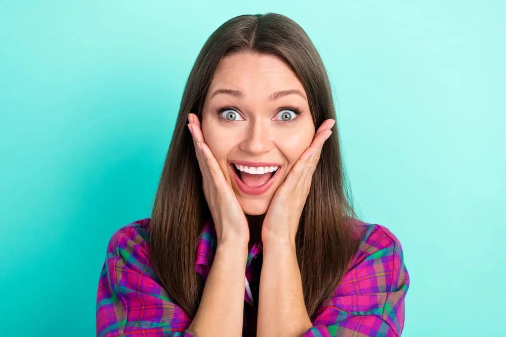 What Is 1C Hair? How To Take Care of It, Styles, and Products 11 A young lady dealing with hair frizz, oily roots, and depleted amino acids wanting to change her hair care routine.