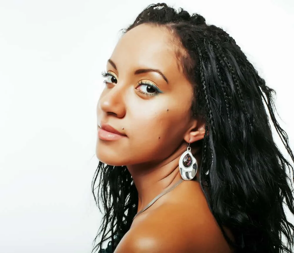 Why Has My Hair Started Parting in the Back of My Head? 3 A cute young African American female with her long hair shedding has been using multiple hair loss treatments.