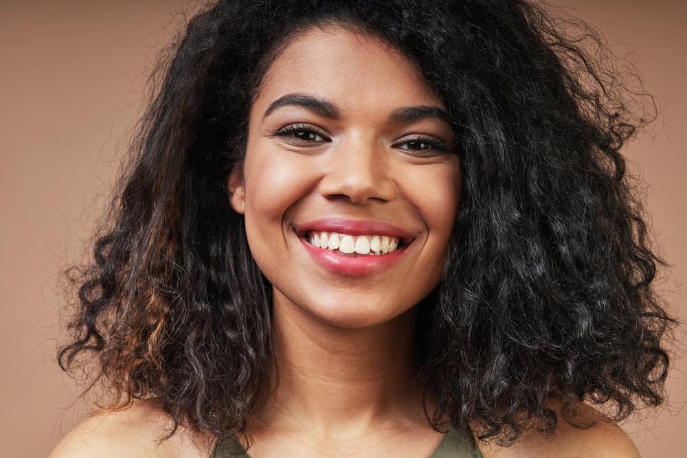 How to Get Curly Hair Back After Straightening It Too Much