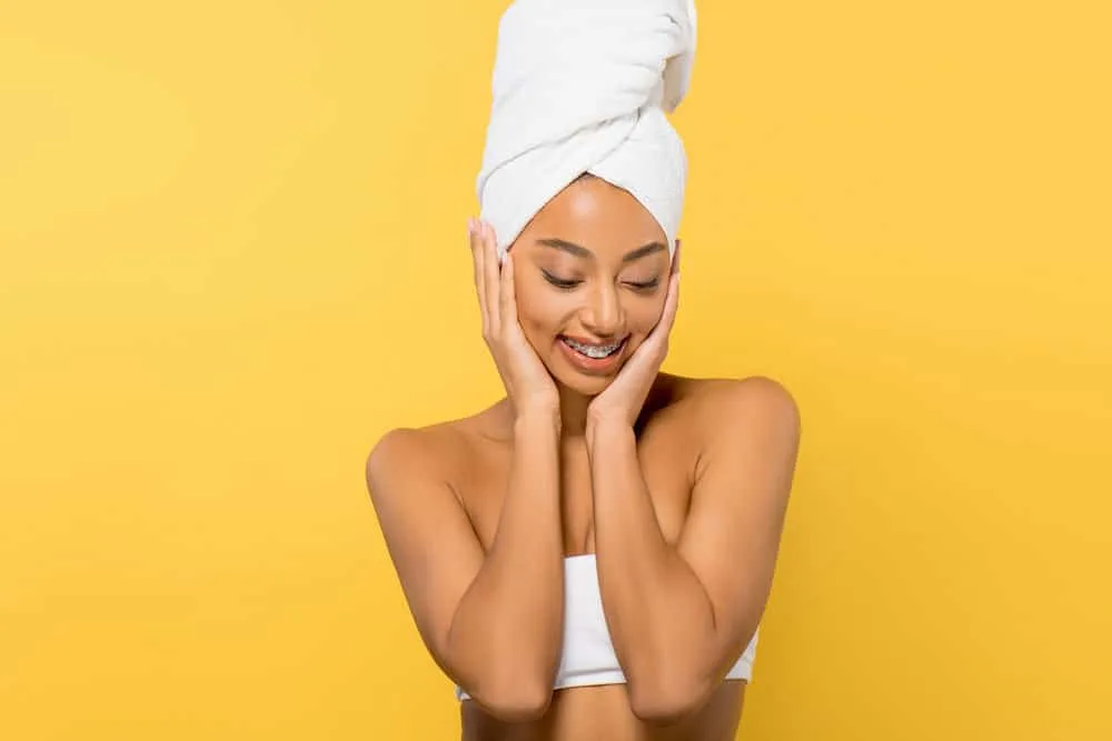 How to Plop Hair Overnight With a T-Shirt or Microfiber-Towel 11 African American female that used leave-in hair products before plopping using the head and flip technique.
