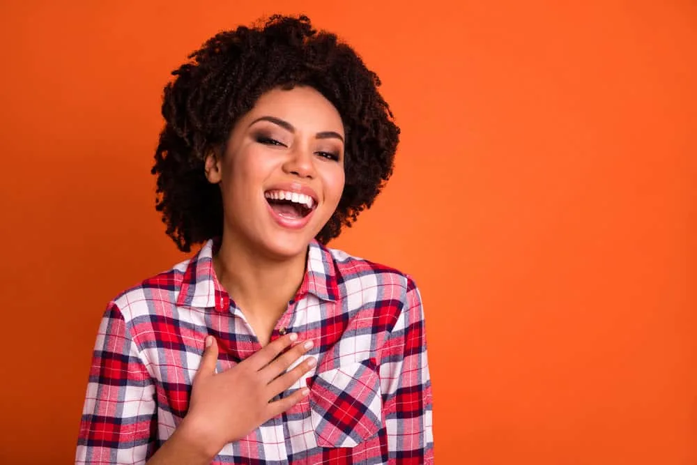 Why Your Hair Grows Outwards Not Down and How to Style It 7 A sweet young lady eliminated her thinning hair loss concerns by using a hair growth hair care routine.