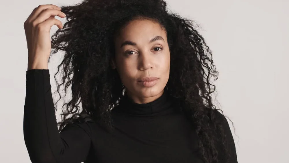 How to Thin Out Hair With and Without Thinning Shears 5 A young female that's been thinning our hair but wants to avoid making her hair blunt with sharp scissors.