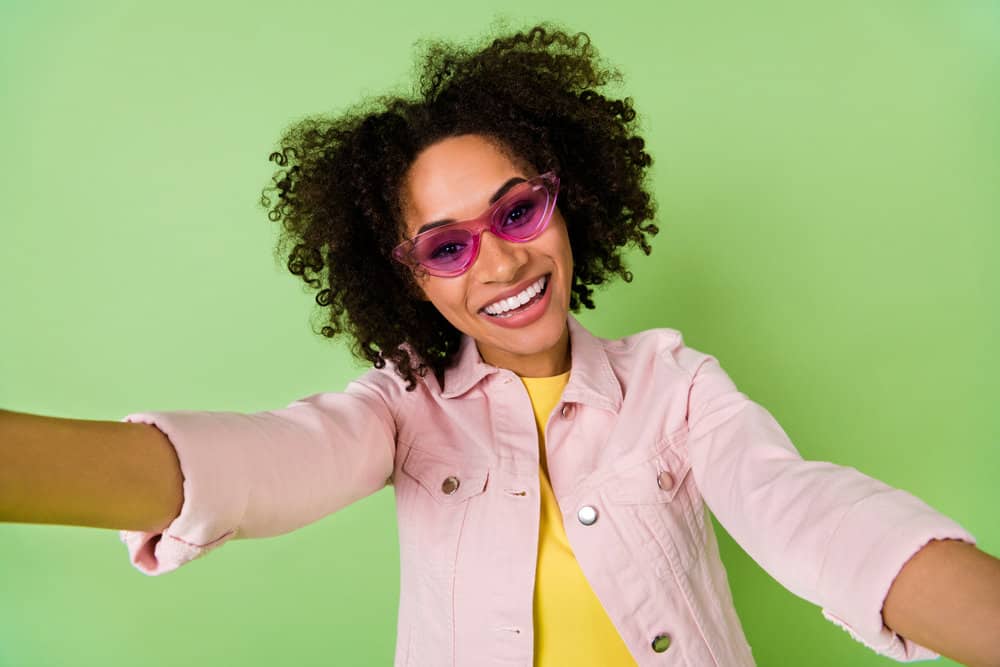 A cute black proves that hair elasticity exists since she'd have longer strands if she had a straight hair type.