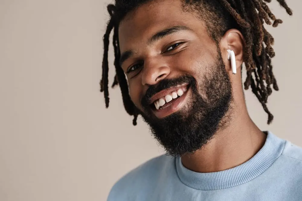 How Often Should You Oil Your Locs? Should You Oil Them Daily? 2 A young black male with a 4B hair texture has dry hair follicles moisturized with natural oils, like tea tree oil.