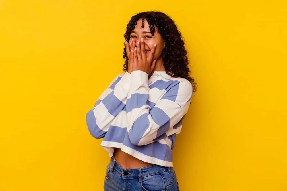Does Your Scalp Itch When Your Hair Is Growing? Solutions? 1 A young mixed-race female with loose and scaly skin on her scalp, wondering if it will cause rapid hair growth.