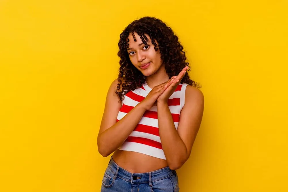 How to Stop Wave Nouveau Breakage: DIY Step-by-Step Guide 4 A mixed-race lady that used a Wave Nouveau neutralizer and chemical perm system in her naturally curly hair.