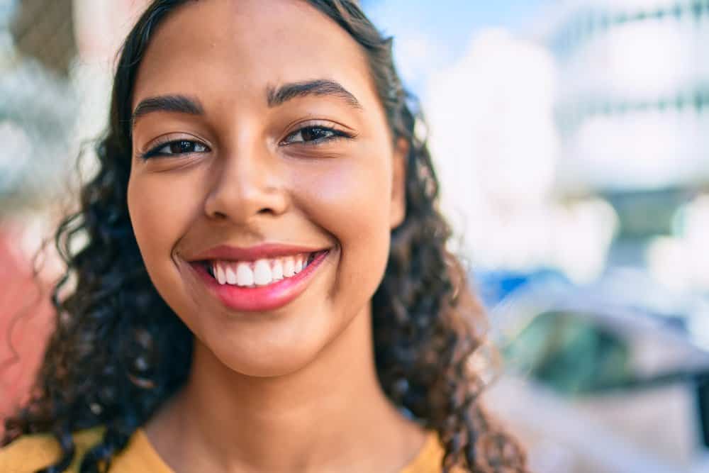 A young African American female with a thinning hairline on her 3A natural hair follicles wanted to thicken hair edges.