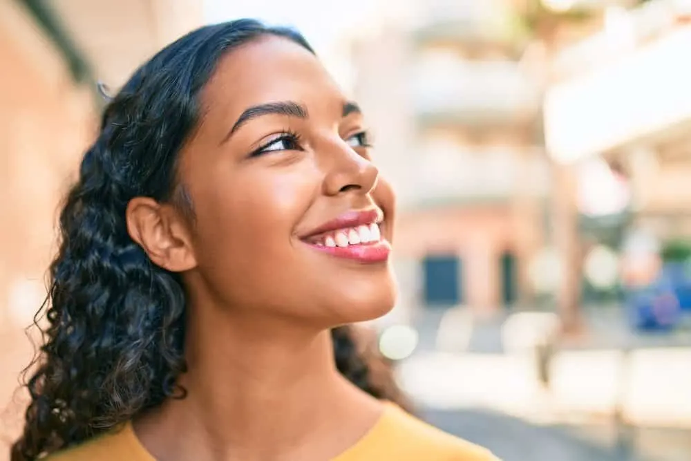 How Long Does It Take for Edges to Grow Back? Bald Edges? 7 A female with naturally curly hair recently cleaned with a sulfate-free shampoo to discourage damaged edges.