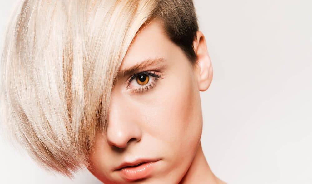 A beautiful young female that keeps her hair healthy with regular trims to fix unruly sections and split ends.