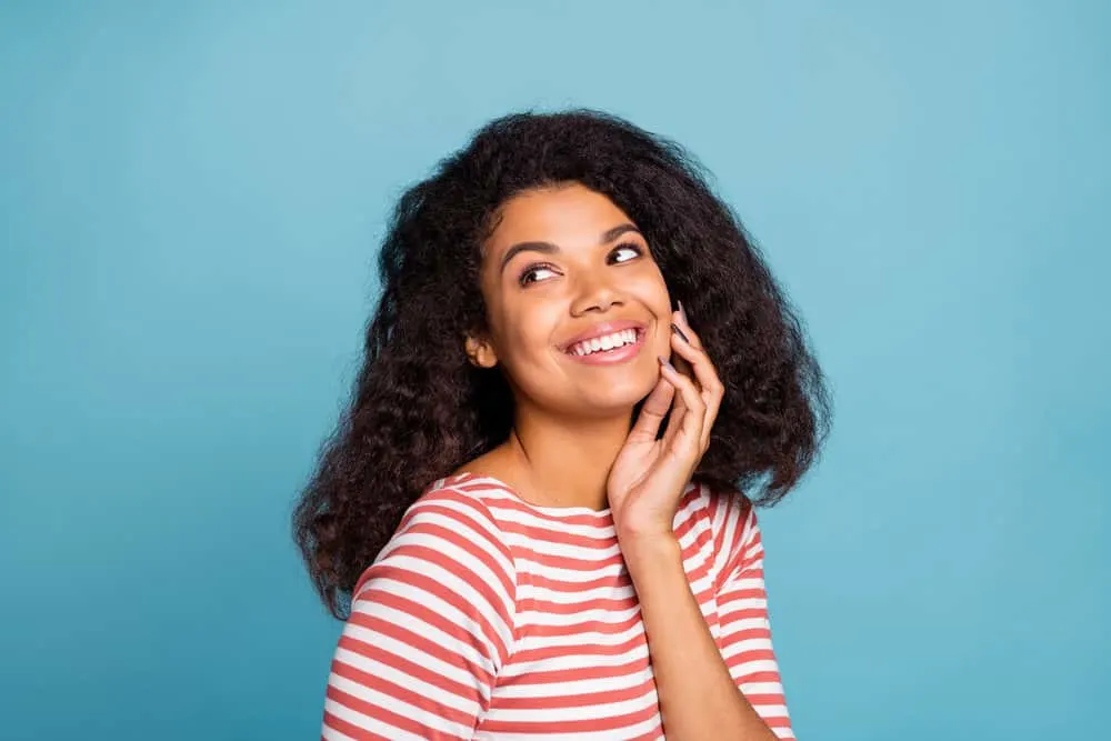 How Much Hair Is Cut Off in a Trim and Signs You Need a Trim 6 A lovely young female with long hair without any chemical treatments and relaxers.